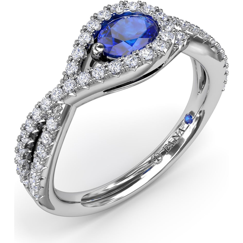 East-to-West Oval Sapphire Ring with Diamond Halo and Split Shank by Fana - 0.87 Carat Total Gemstone Weight