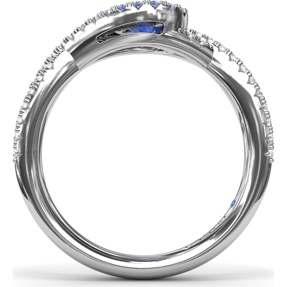 East-to-West Oval Sapphire Ring with Diamond Halo and Split Shank by Fana - 0.87 Carat Total Gemstone Weight