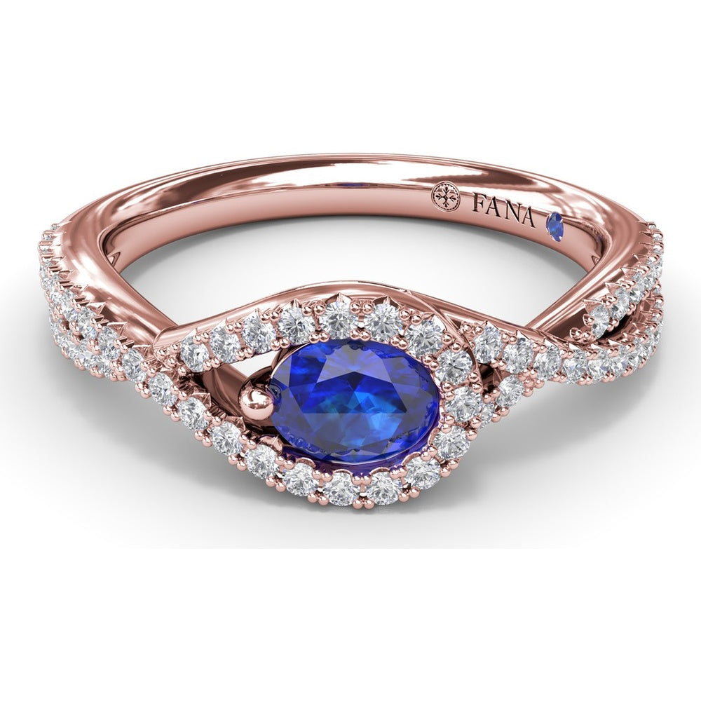 East-to-West Oval Sapphire Ring with Diamond Halo and Split Shank by Fana - 0.87 Carat Total Gemstone Weight
