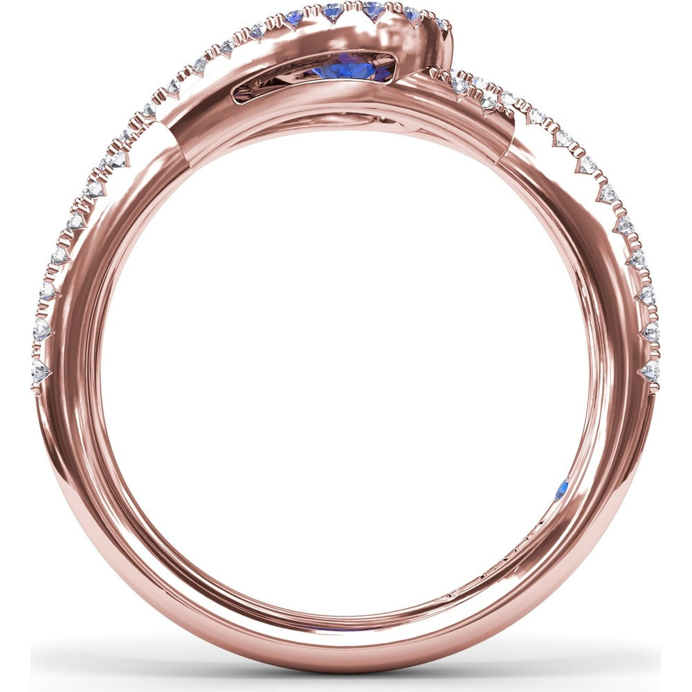 East-to-West Oval Sapphire Ring with Diamond Halo and Split Shank by Fana - 0.87 Carat Total Gemstone Weight
