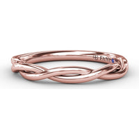 Elegantly Twisted Wedding Band with Polished Finish by Fana