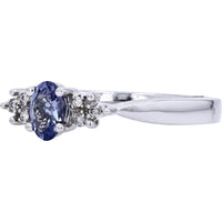 Enchanting 14K White Gold Oval Tanzanite Ring with Diamond Accents - 0.03 Carat Total Diamond Weight
