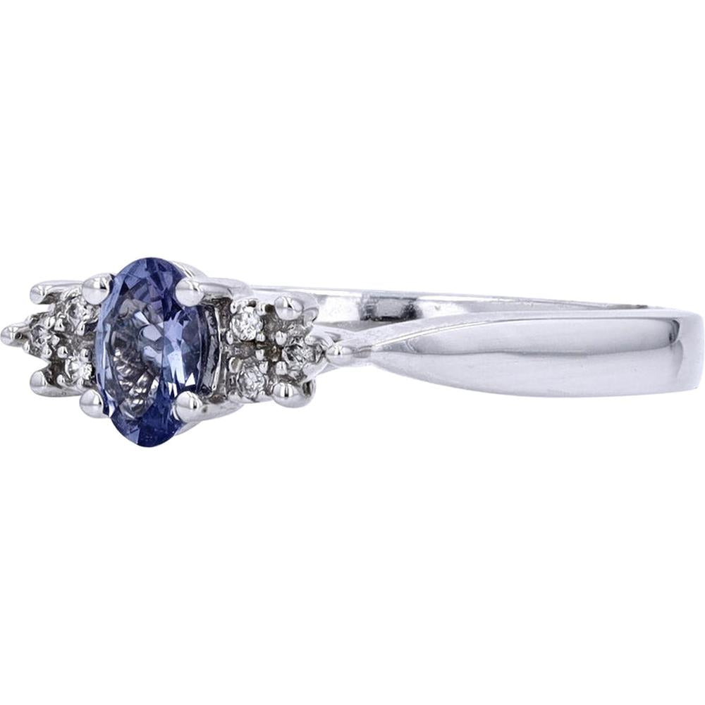 Enchanting 14K White Gold Oval Tanzanite Ring with Diamond Accents - 0.03 Carat Total Diamond Weight