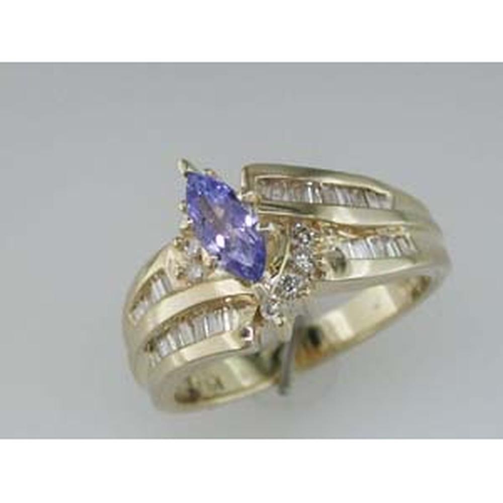 Enchanting 14K Yellow Gold Tanzanite and Diamond Halo Ring
