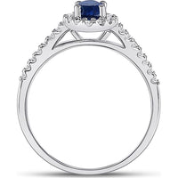 GND 10K White Gold Oval Synthetic Blue Sapphire and Diamond Halo Ring - 0.70 Carat Total Gemstone Weight