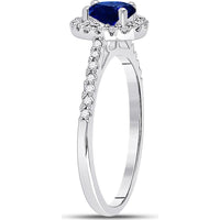 GND 10K White Gold Oval Synthetic Blue Sapphire and Diamond Halo Ring - 0.70 Carat Total Gemstone Weight