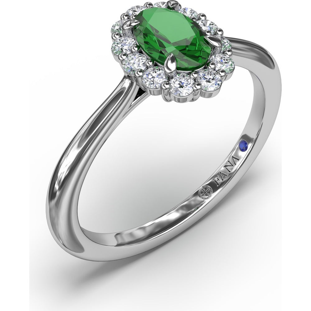 Halo Ring with Oval Emerald and Round Diamond Accents by Fana - 0.67 Carat Total Diamond Weight