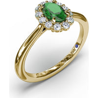 Halo Ring with Oval Emerald and Round Diamond Accents by Fana - 0.67 Carat Total Diamond Weight