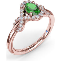 Love Knot Ring with Oval Emerald and Diamond Criss-Cross Halo by Fana - 0.67 Carat Total Gemstone Weight