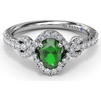 Love Knot Ring with Oval Emerald and Diamond Halo by Fana - 0.87 Carat Total Gemstone Weight