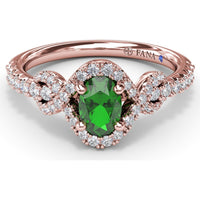 Love Knot Ring with Oval Emerald and Diamond Halo by Fana - 0.87 Carat Total Gemstone Weight