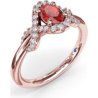 Love Knot Ring with Oval Ruby and Diamond Criss-Crossing Halo by Fana - 0.85 Carat Total Gemstone Weight