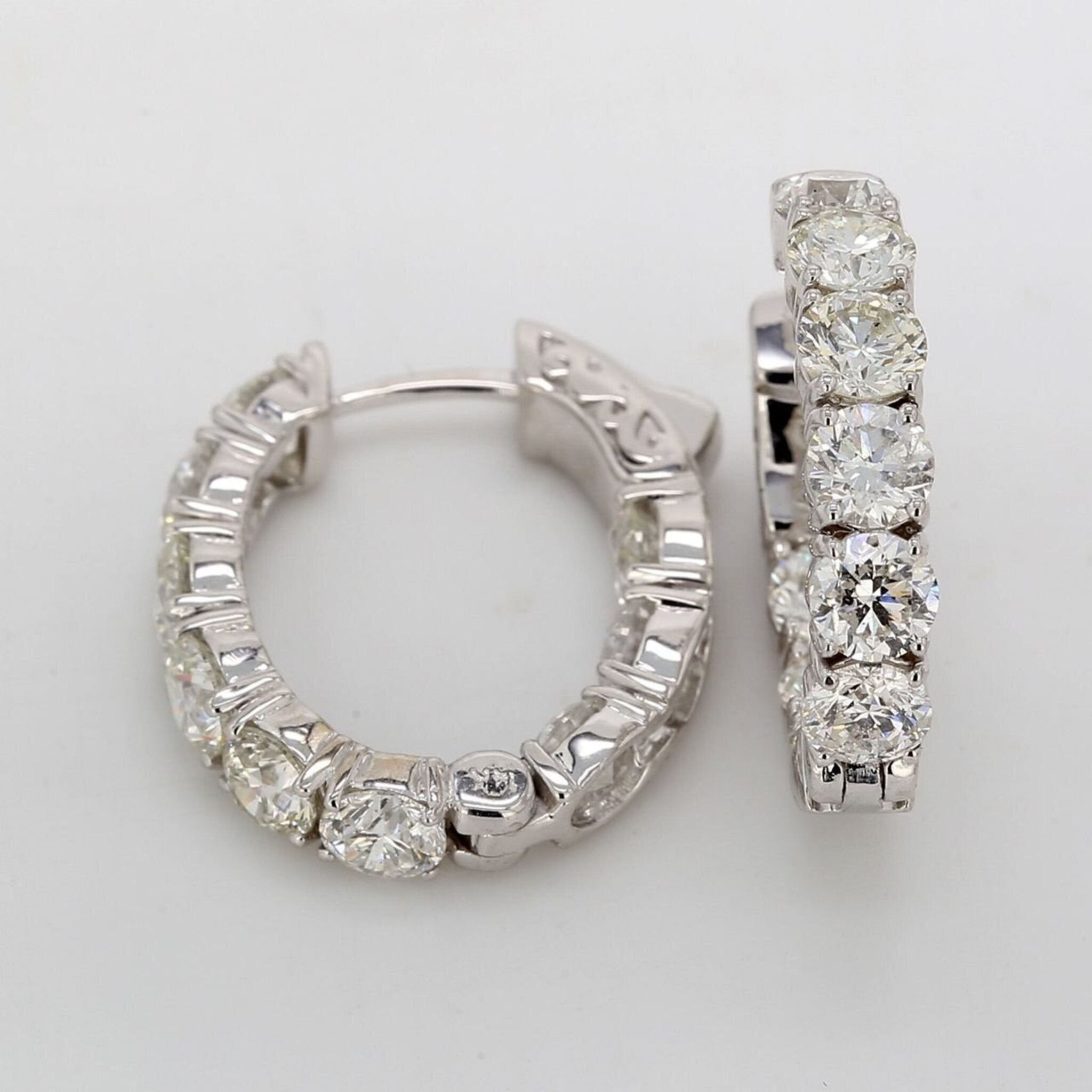Ninacci 14K White Gold 0.75" Oval Shaped Inside Out Hoop Earrings with Shared Prong Set Round Diamonds - 5.40 Carat Total Diamond Weight