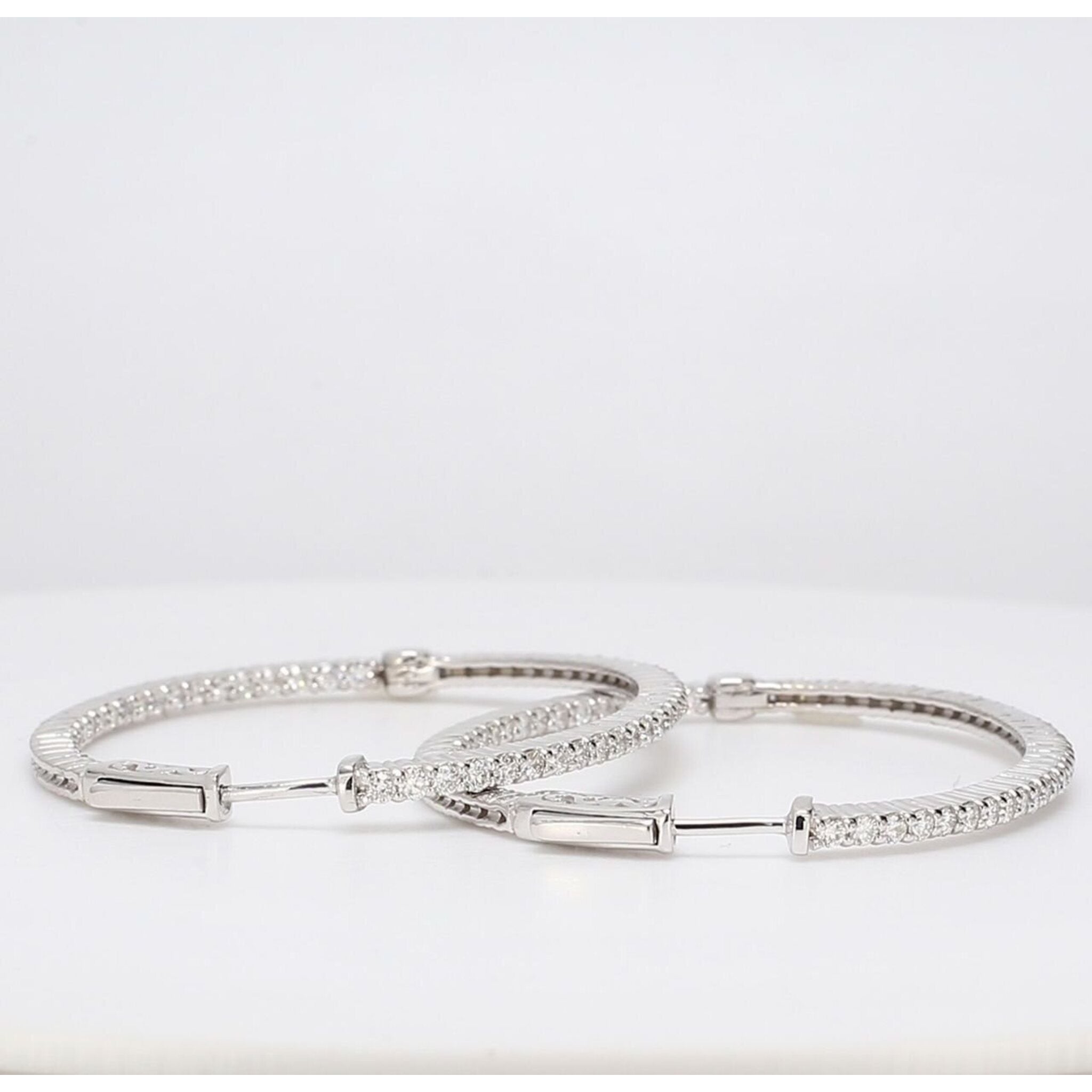 Ninacci 14K White Gold Oval Shaped Inside Out Hoop Earrings with Shared Prong Set Round Diamonds - 2.17 Carat Total Diamond Weight