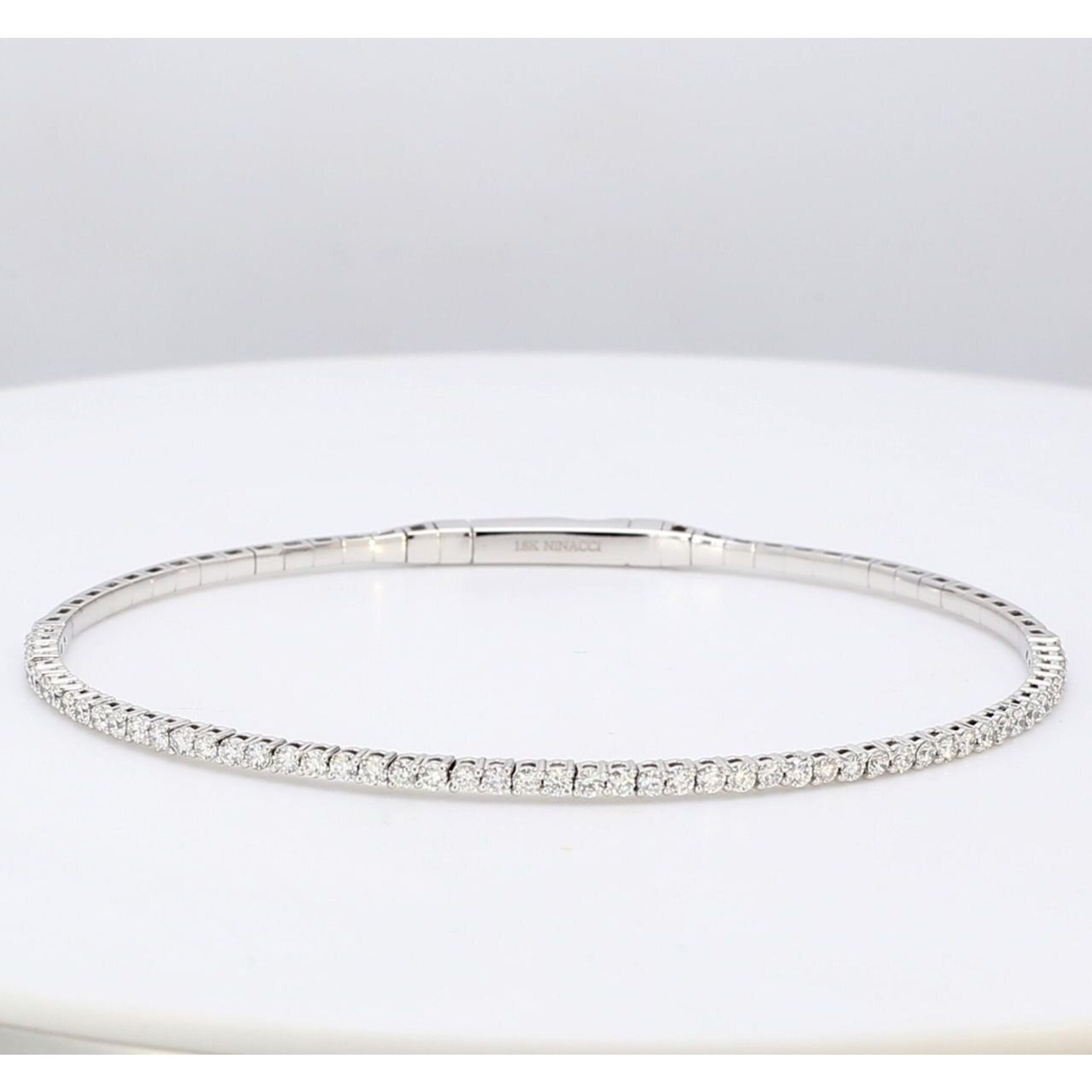Ninacci 18K White Gold 6.5" Oval Bangle with 1.04 Carat Total Diamond Weight Round Diamonds