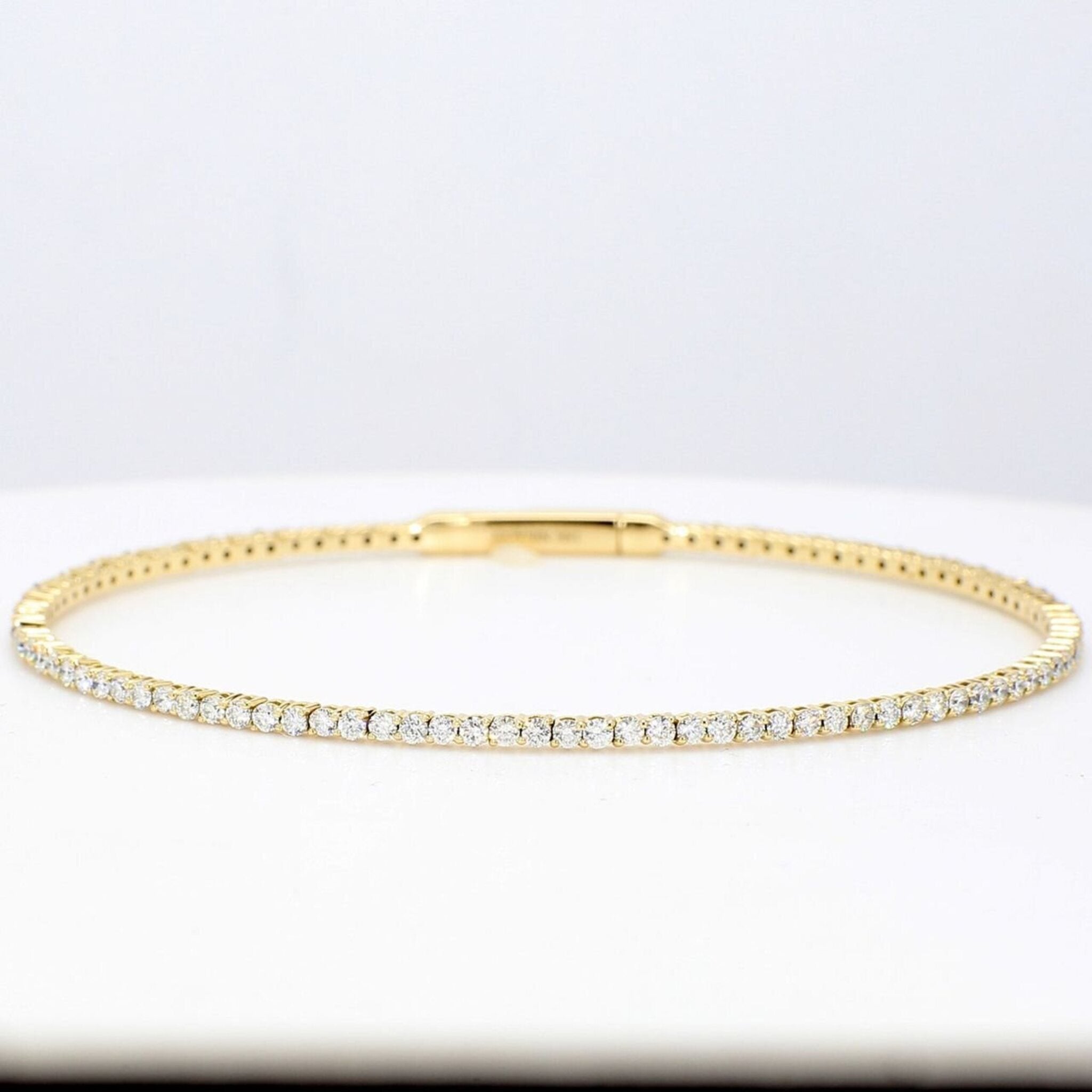 Ninacci 18K Yellow Gold Oval Shaped Eternity Bangle with 1.63 Carats French Pavé Diamonds