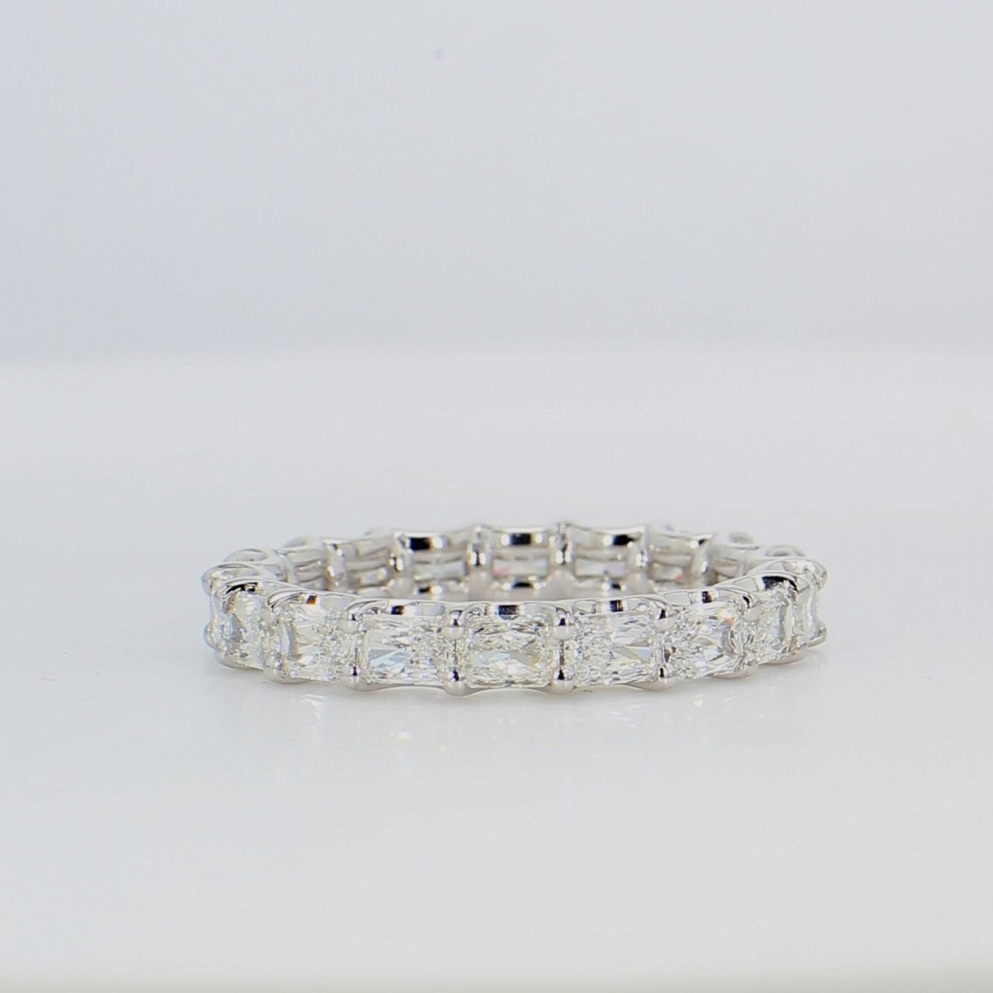 Ninacci Platinum East-to-West Radiant Cut Diamond Eternity Band - 2.80 Carat Total Diamond Weight - Size 7