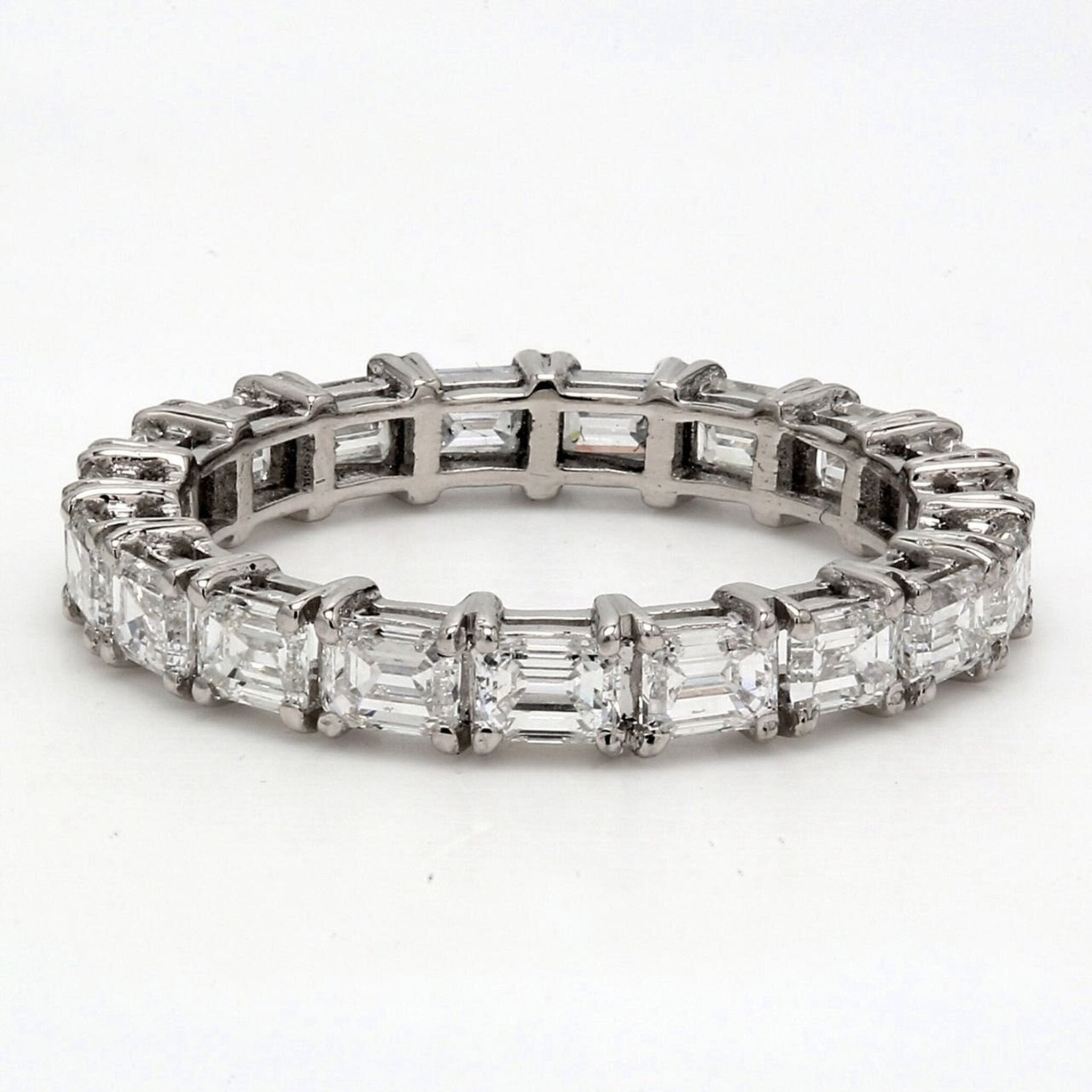 Ninacci Platinum East to West Style Eternity Band with 2.57 Carats Emerald Cut Diamonds - Size 7.0