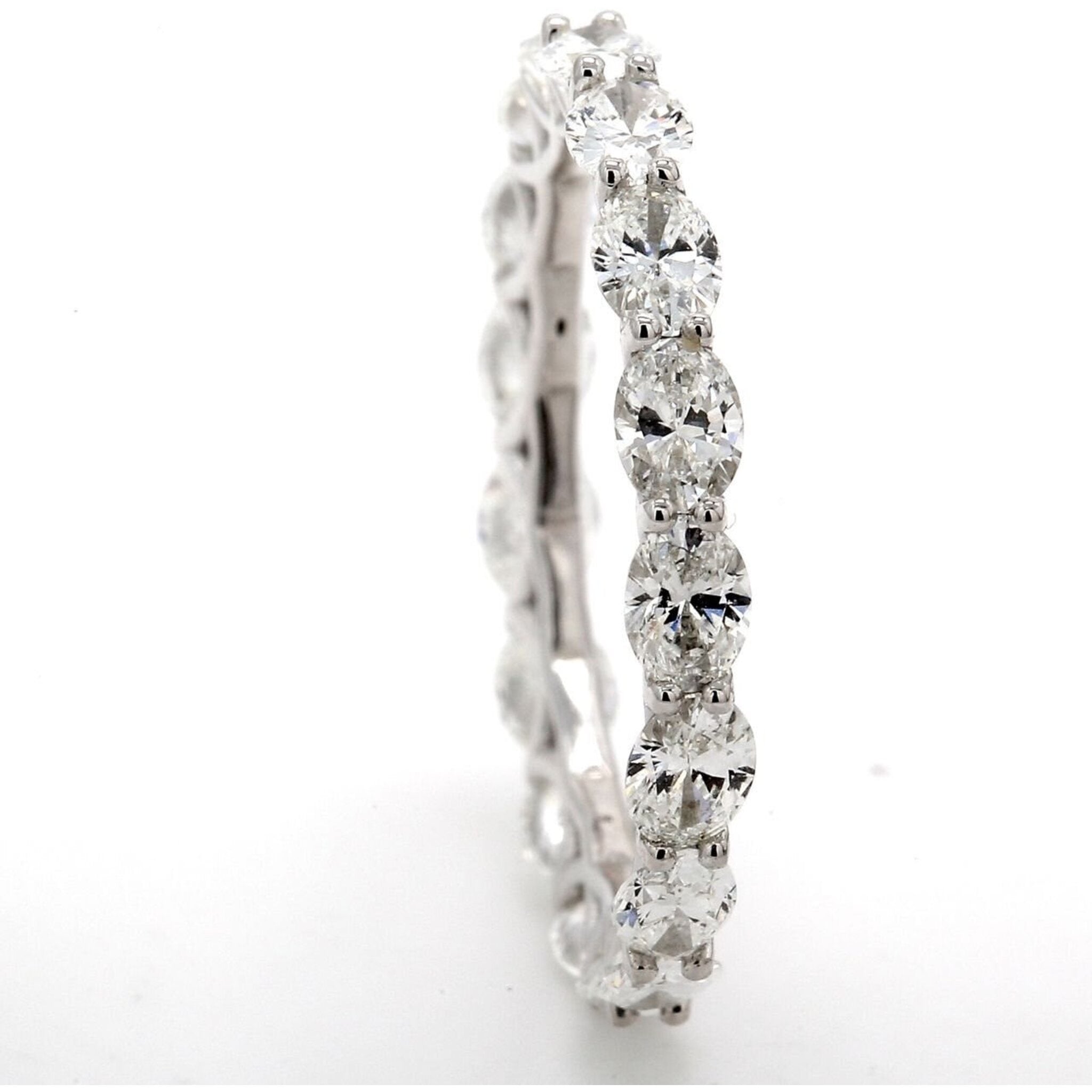 Ninacci Platinum Eternity Band with 2.43 Carats Oval Cut Diamonds - Size 7.0