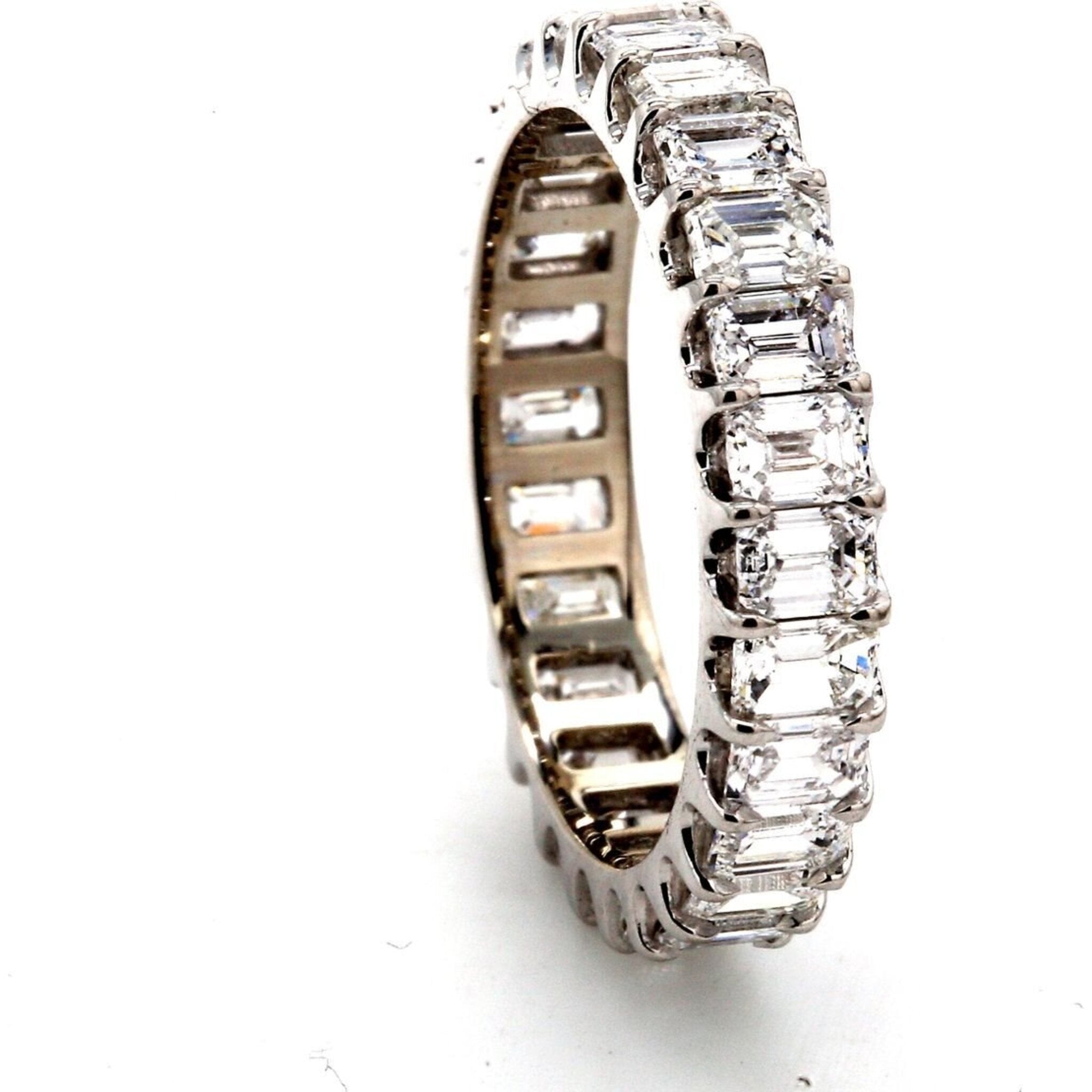 Ninacci Platinum Eternity Band with (26) Emerald Cut Diamonds - 2.67 Carat Total Diamond Weight - Size 5.5