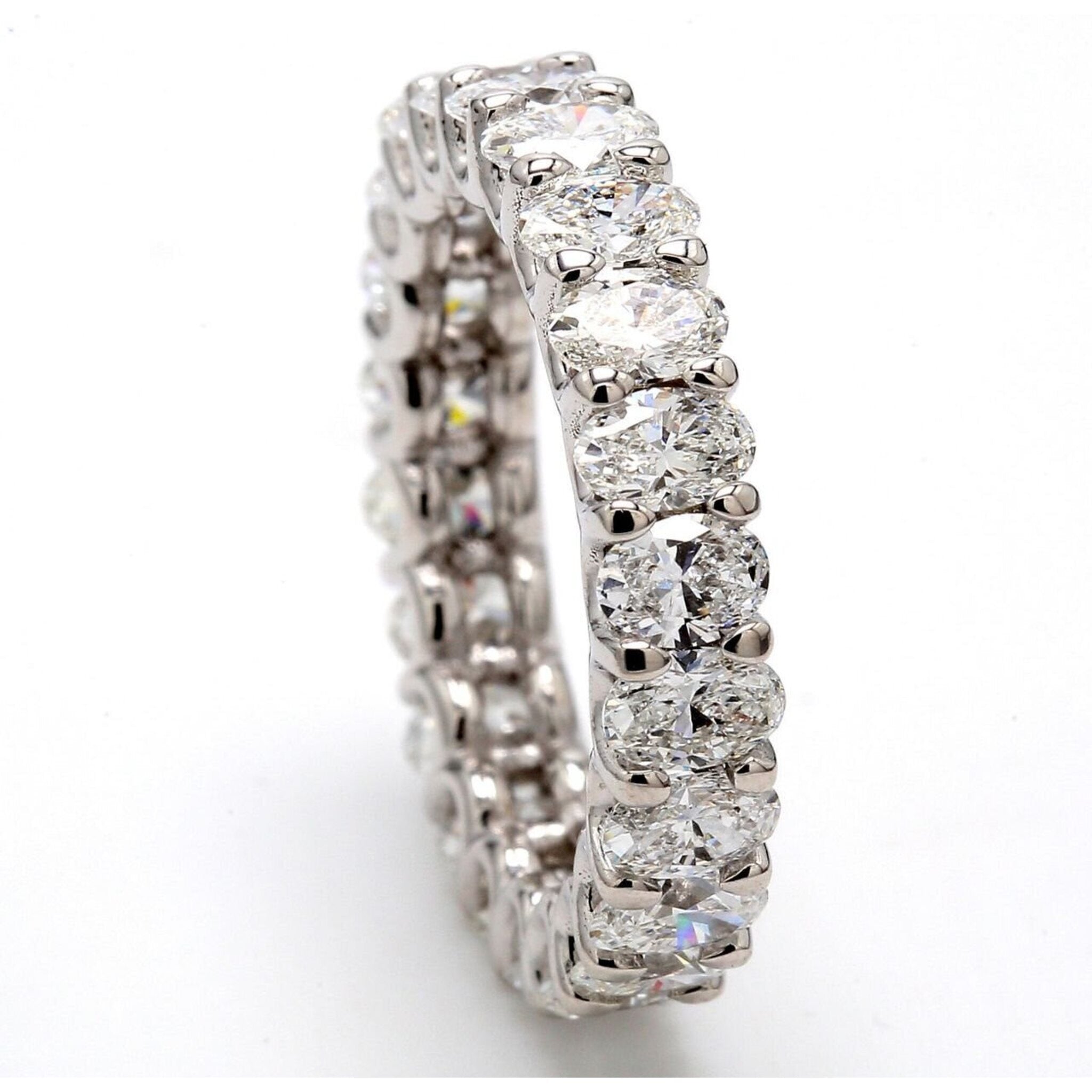 Ninacci Platinum Eternity Band with 3.11 Carats Oval Diamonds - Size 5.0