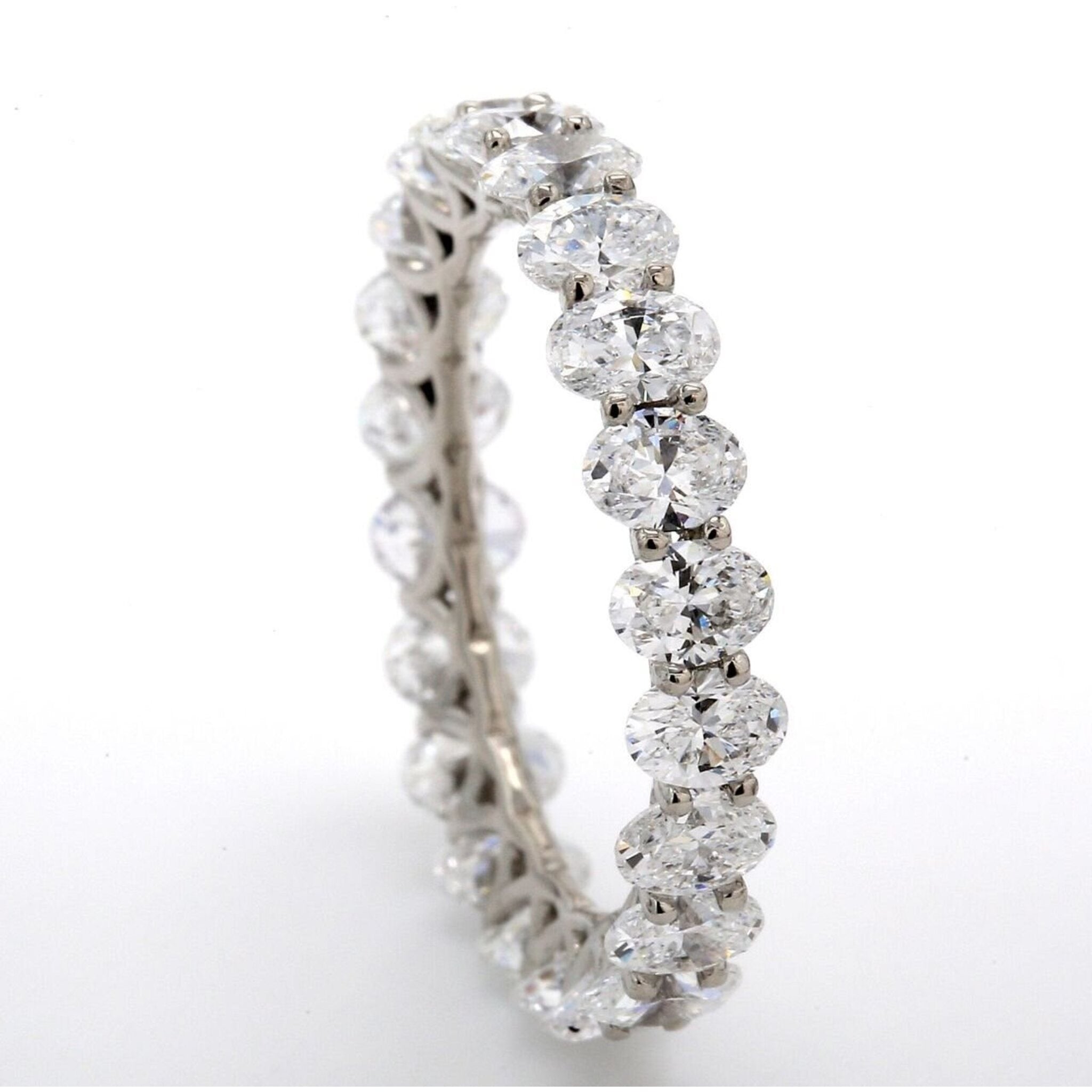 Ninacci Platinum Eternity Band with 3.12 Carats Oval Cut Diamonds - Size 6.25