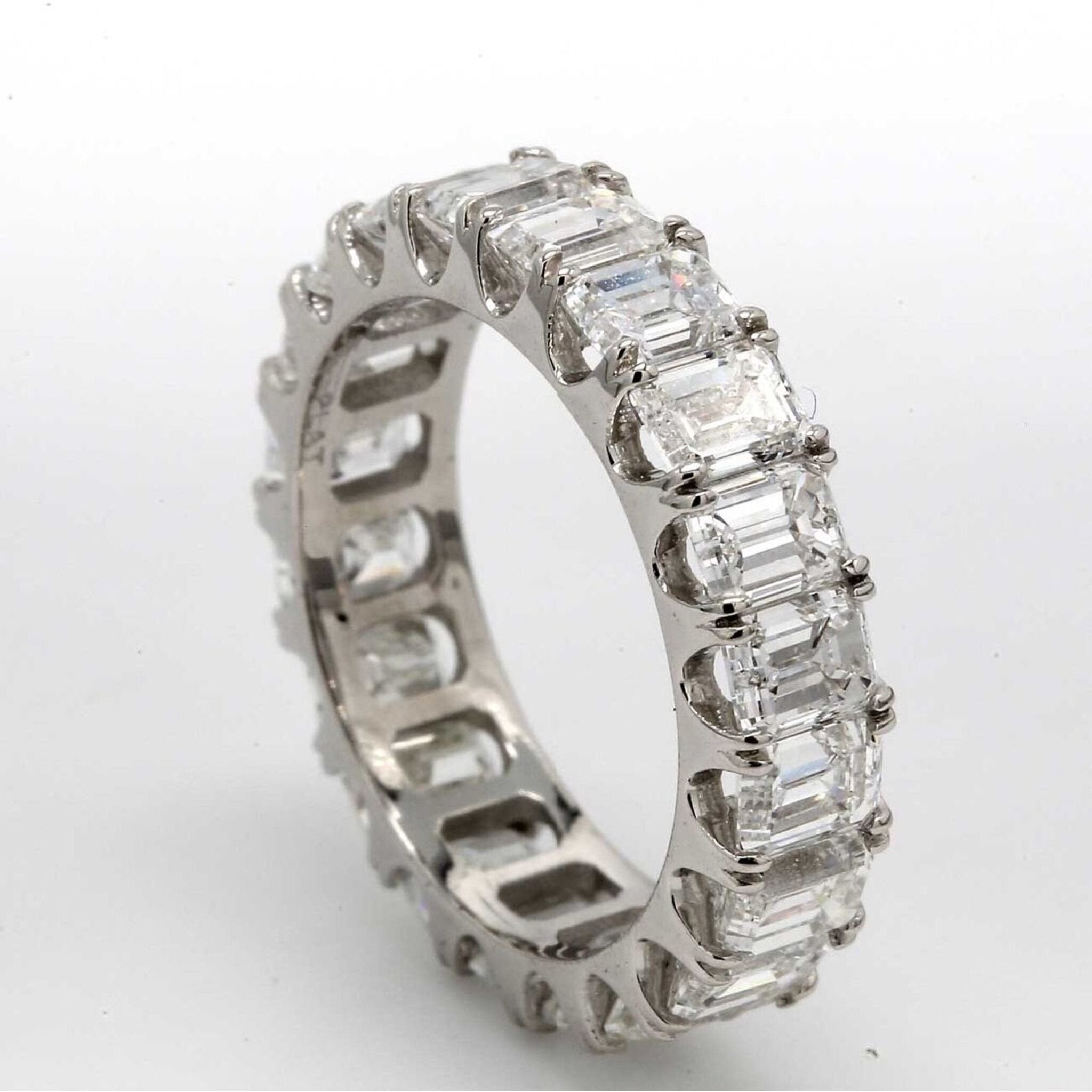 Ninacci Platinum Eternity Band with 6.30 Carats Emerald Cut Diamonds - Size 5.0