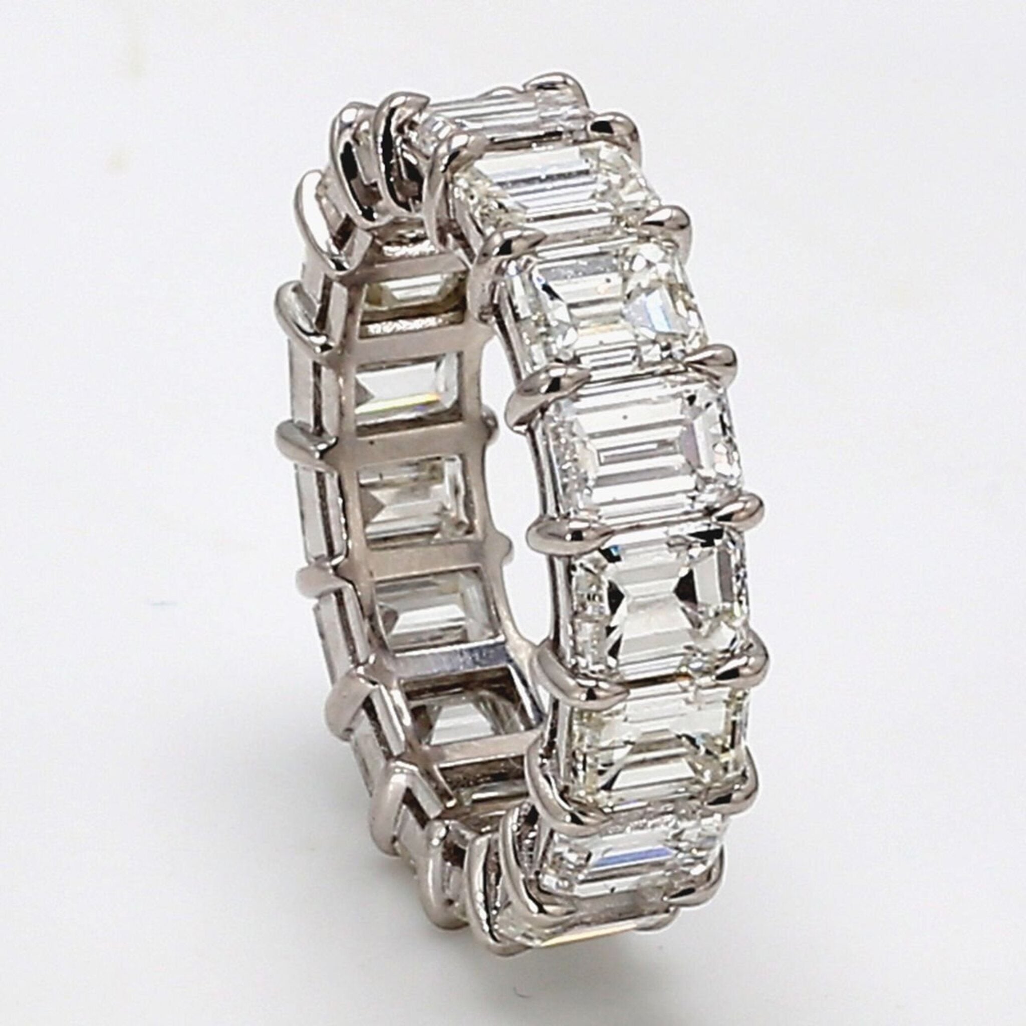 Ninacci Platinum Eternity Band with 8.61 Carats Emerald-Cut Diamonds - Size 6.