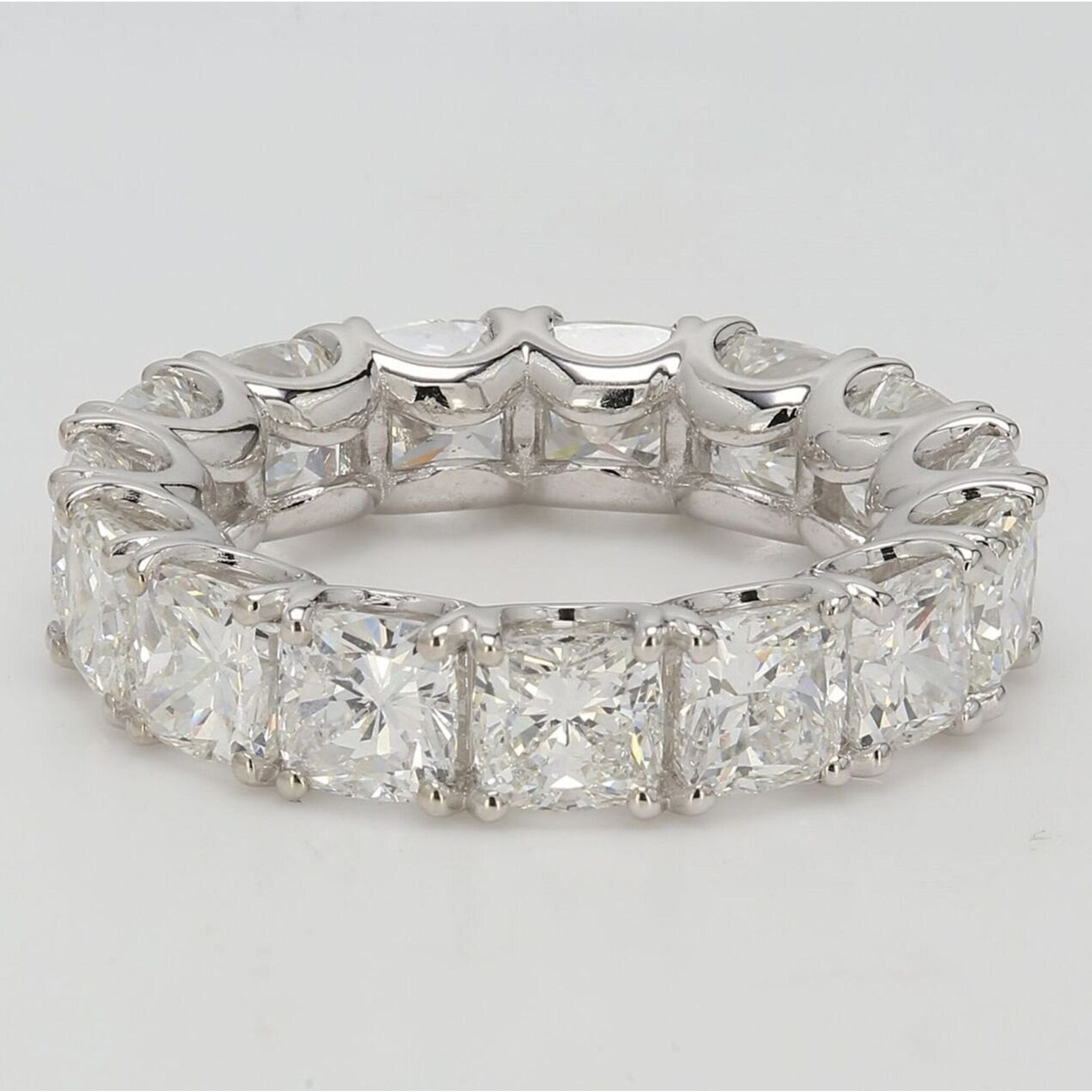 Ninacci Platinum Eternity Band with U-Prong Set Cushion Cut Diamonds - 7.34 Carat Total Diamond Weight - Size 4.5