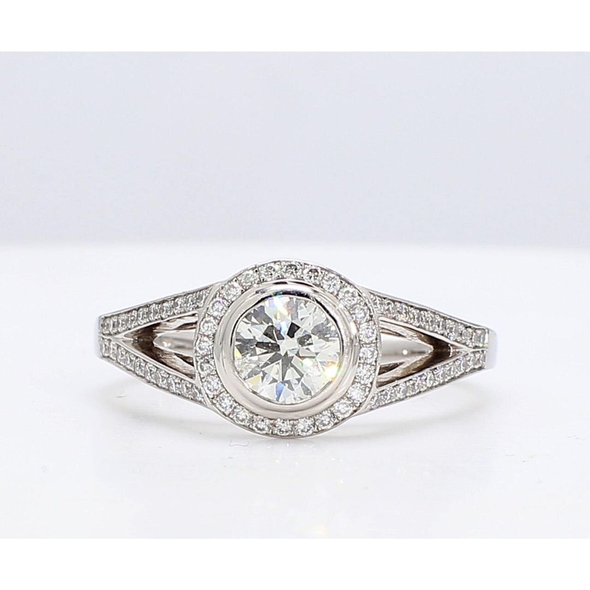 Ninacci Platinum Halo Ring with GIA Certified 0.72 Carats Round Center Diamond - 1.32 Carat Total Diamond Weight Dazzling Elegance in Platinum