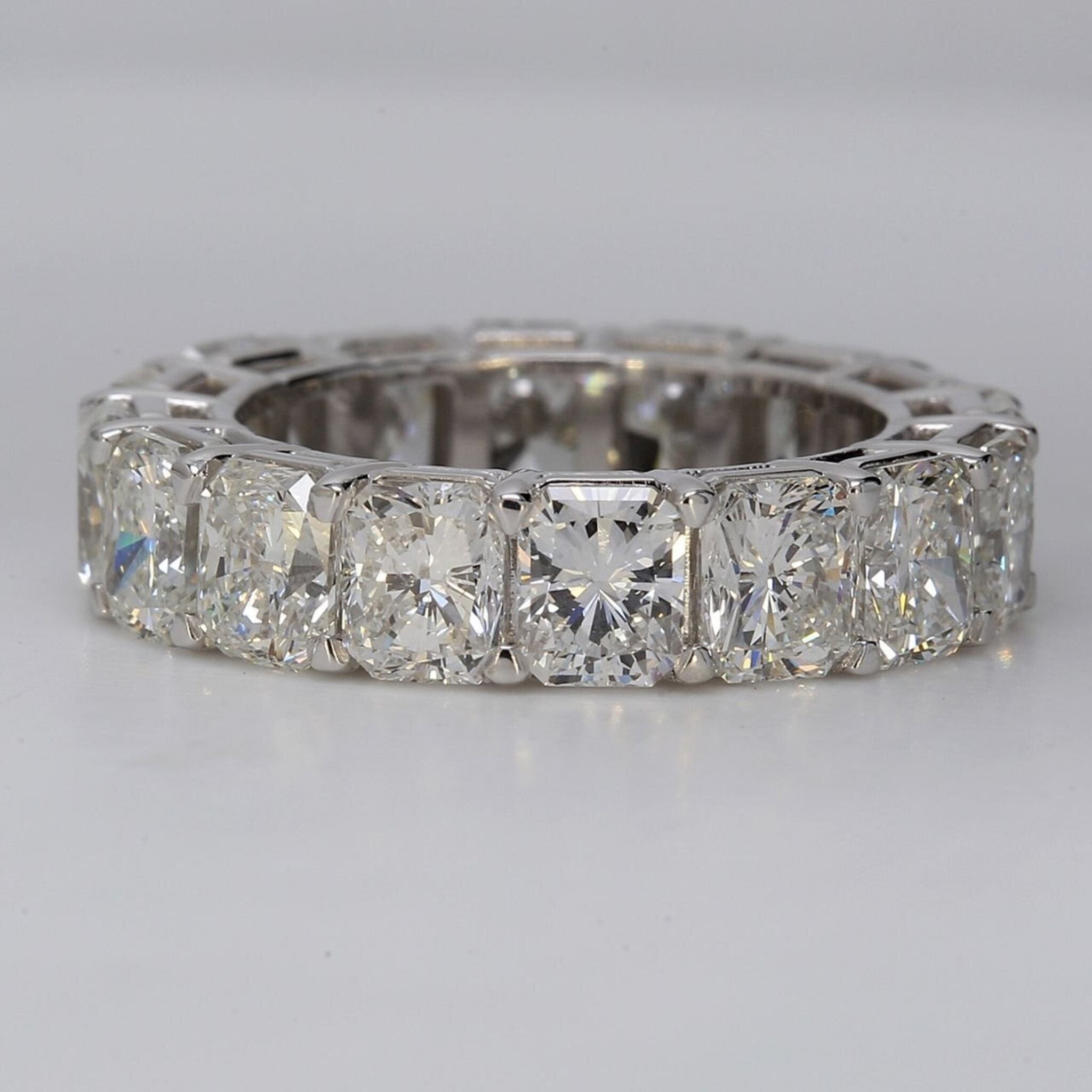 Ninacci Platinum Radiance Eternity Band - 7.79 Carat Total Diamond Weight F+/VS+ Radiant Cut Diamonds - Size 5.5