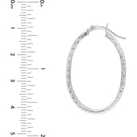 Olas d'Oro - 10K White Gold Diamond-Cut Oval Hoop Earrings - 3mm x 32mm