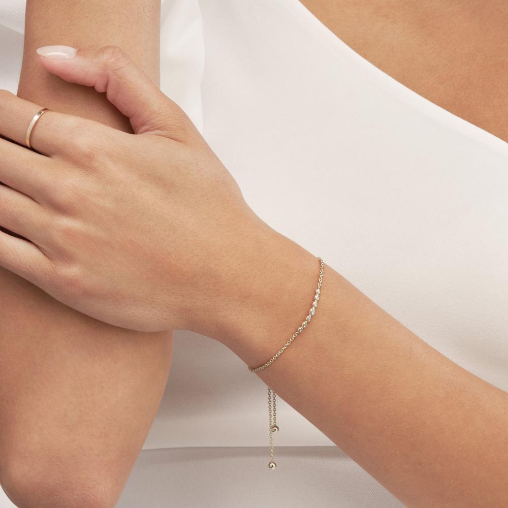 Olas d'Oro - 14K White Gold Bolo Bracelet with Graduated Bezel-Set Diamonds - 0.10 Carat Total Diamond Weight