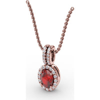 Oval Ruby Pendant with Diamond Halo and Pavé Bail by Fana - 0.81 Carat Total Gemstone Weight