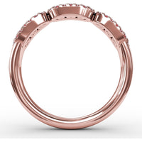 Petite Ruby and Diamond Halo Band with Three Oval Frames by Fana - 0.67 Carat Total Gemstone Weight