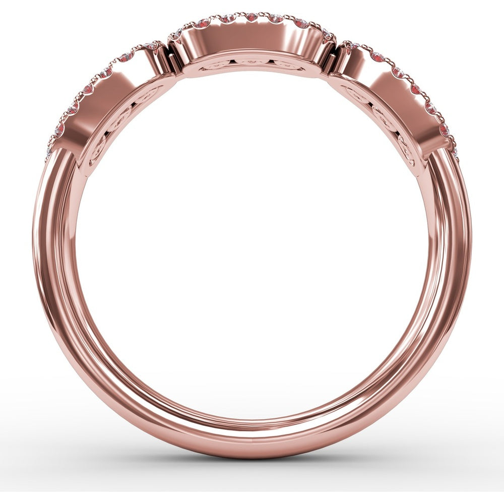 Petite Ruby and Diamond Halo Band with Three Oval Frames by Fana - 0.67 Carat Total Gemstone Weight