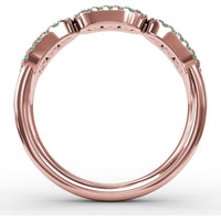 Petite Three-Stone Ring with Round Emeralds and Diamond Halos by Fana - 0.59 Carat Total Gemstone Weight