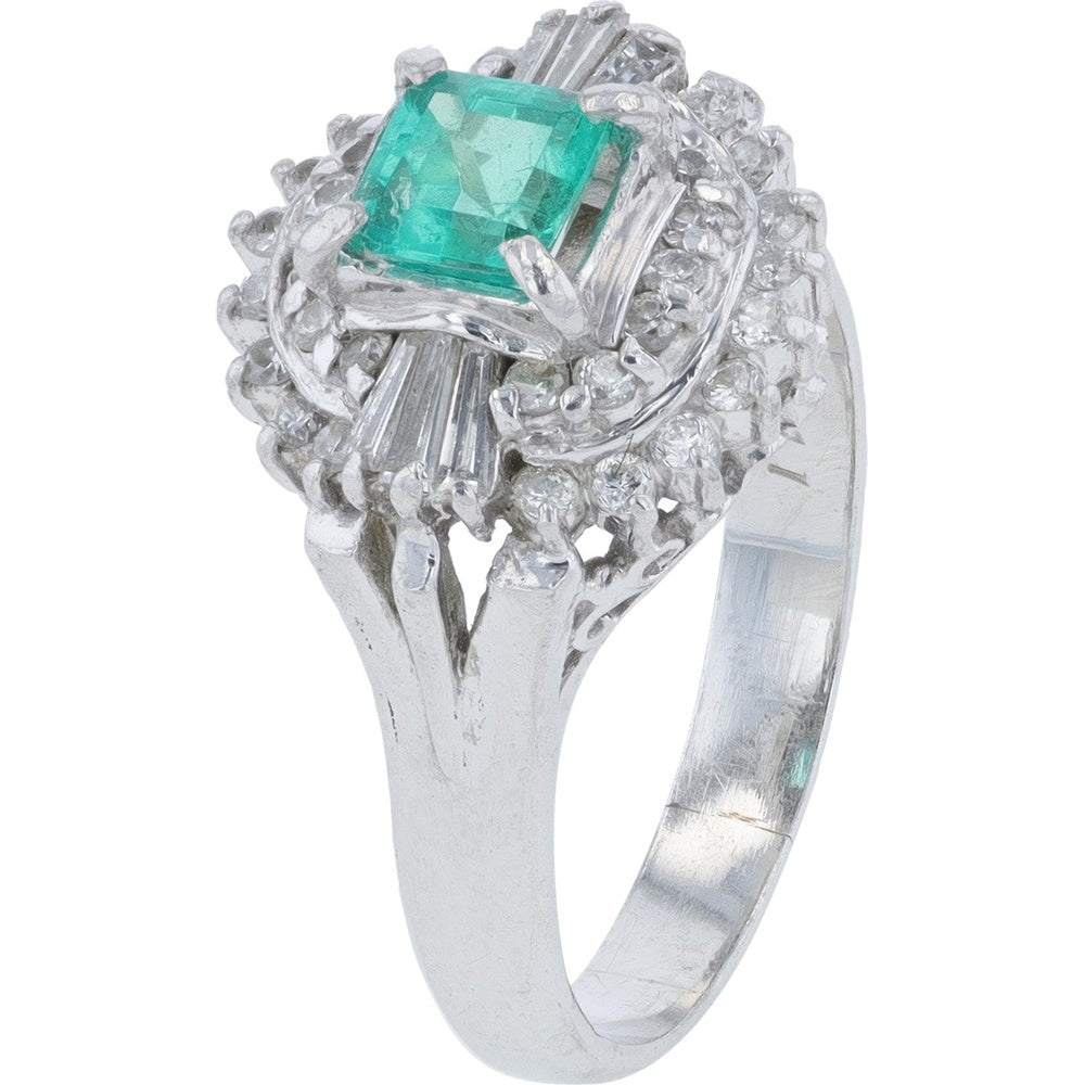 Platinum 0.41 Carat Emerald Ring with 0.56 Carat Total Weight Diamond Halo