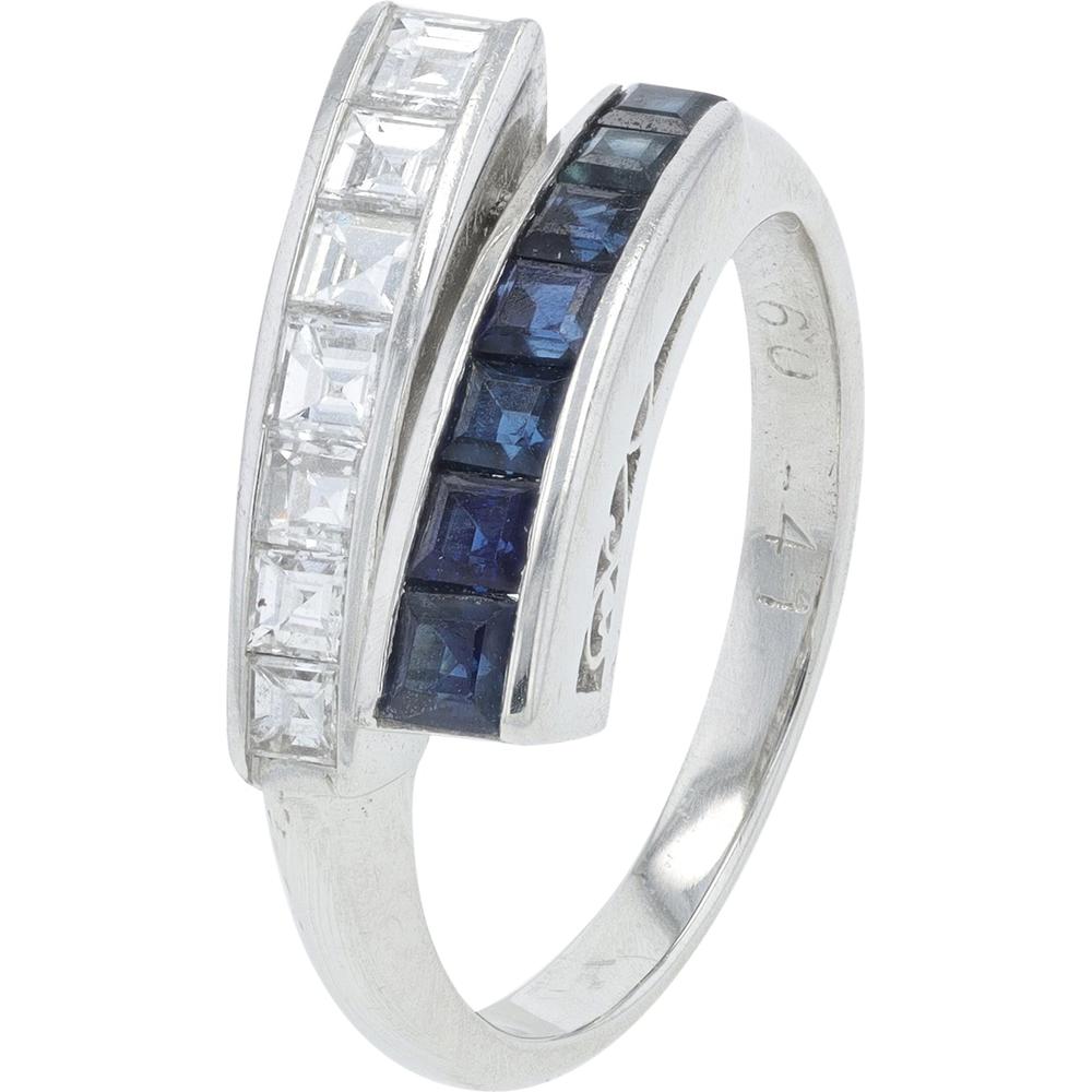 Platinum 0.60 Carat Sapphire Bypass Ring with 0.41 Carat Channel Set Diamonds