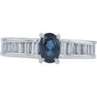 Platinum 0.71 Carat Oval Sapphire Ring with 0.53 Carat Total Diamond Weight