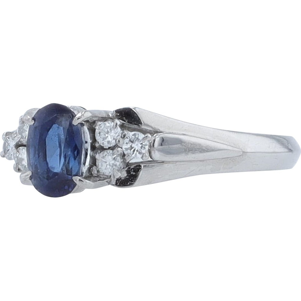 Platinum 0.75 Carat Oval Sapphire Ring with Round Diamond Accents - 0.15 Carat Total Diamond Weight