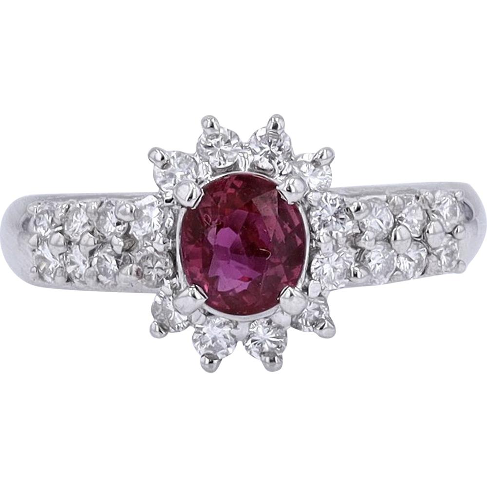 Platinum 0.83 Carat Oval Ruby Ring with 0.50 Carat Diamond Halo - Prong Set