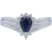 Platinum 0.83 Carat Pear Cut Sapphire Halo Ring with 0.21 Carat Diamond Accents