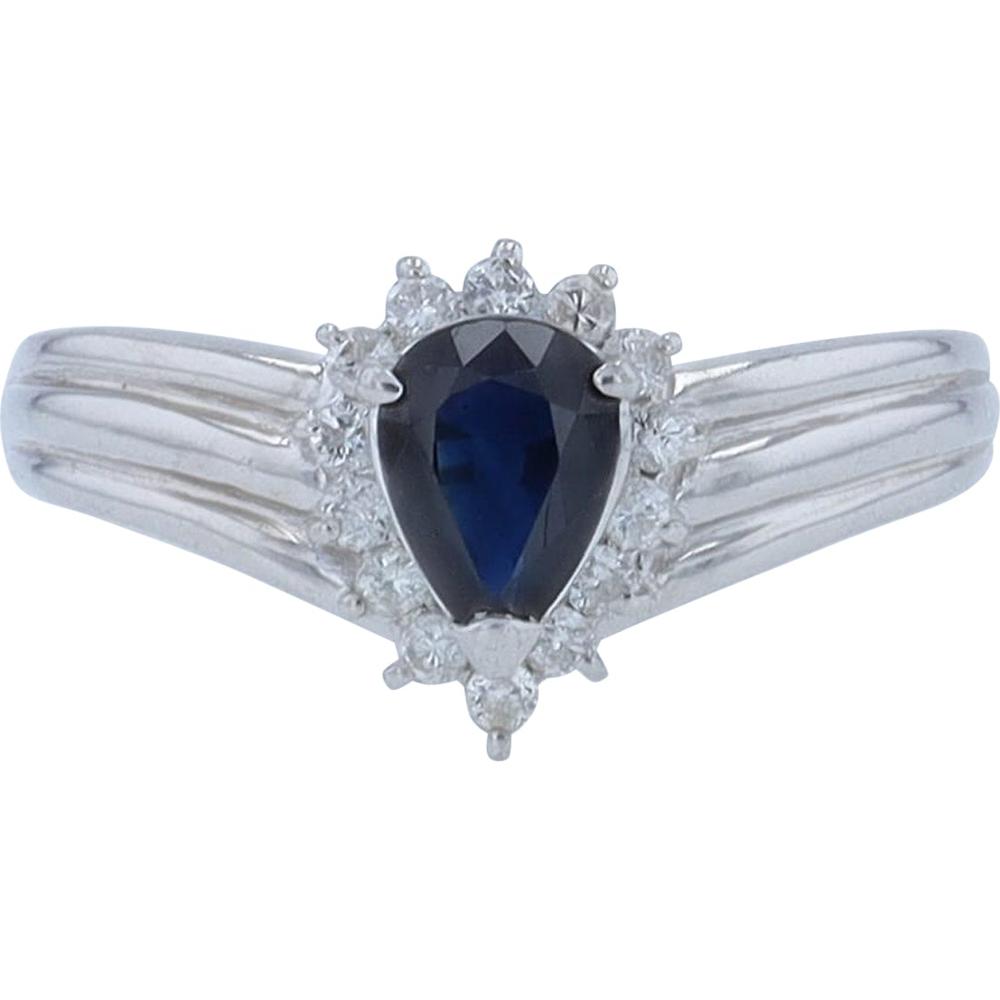 Platinum 0.83 Carat Pear Cut Sapphire Halo Ring with 0.21 Carat Diamond Accents