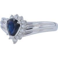 Platinum 0.83 Carat Pear Cut Sapphire Halo Ring with 0.21 Carat Diamond Accents
