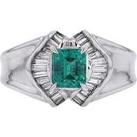 Platinum 0.85 Carat Emerald Ring with 0.33 Carat Baguette Diamond Halo