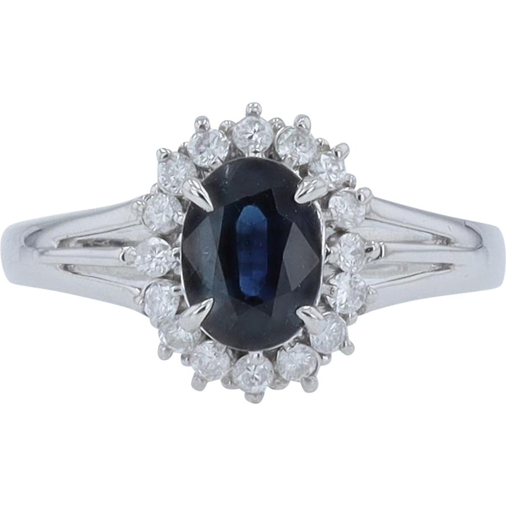 Platinum 0.97 Carat Oval Sapphire Halo Ring with 0.22 Carat Round Diamonds