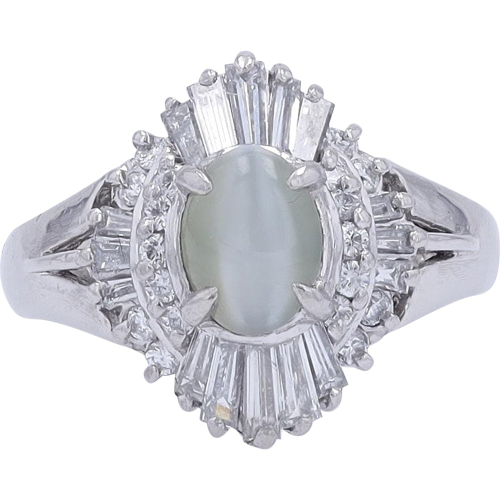Platinum 1.09 Carat Oval Cat's Eye Ring with Sunburst Round and Baguette Diamond Halo - 0.55 Carat Total Diamond Weight