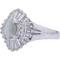 Platinum 1.09 Carat Oval Cat's Eye Ring with Sunburst Round and Baguette Diamond Halo - 0.55 Carat Total Diamond Weight