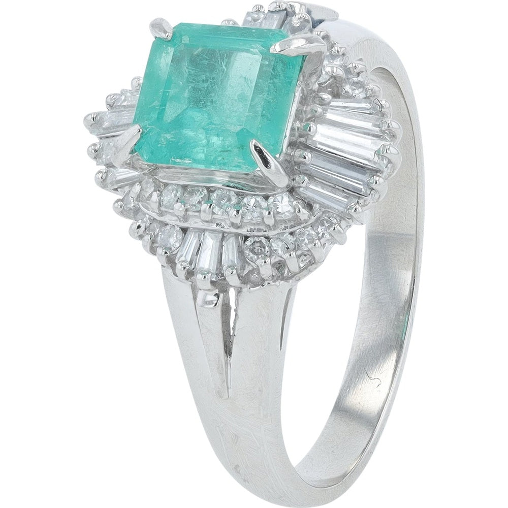 Platinum 1.13 Carat Emerald Ring with 0.45 Carat Diamond Halo Featuring Round and Baguette Accents